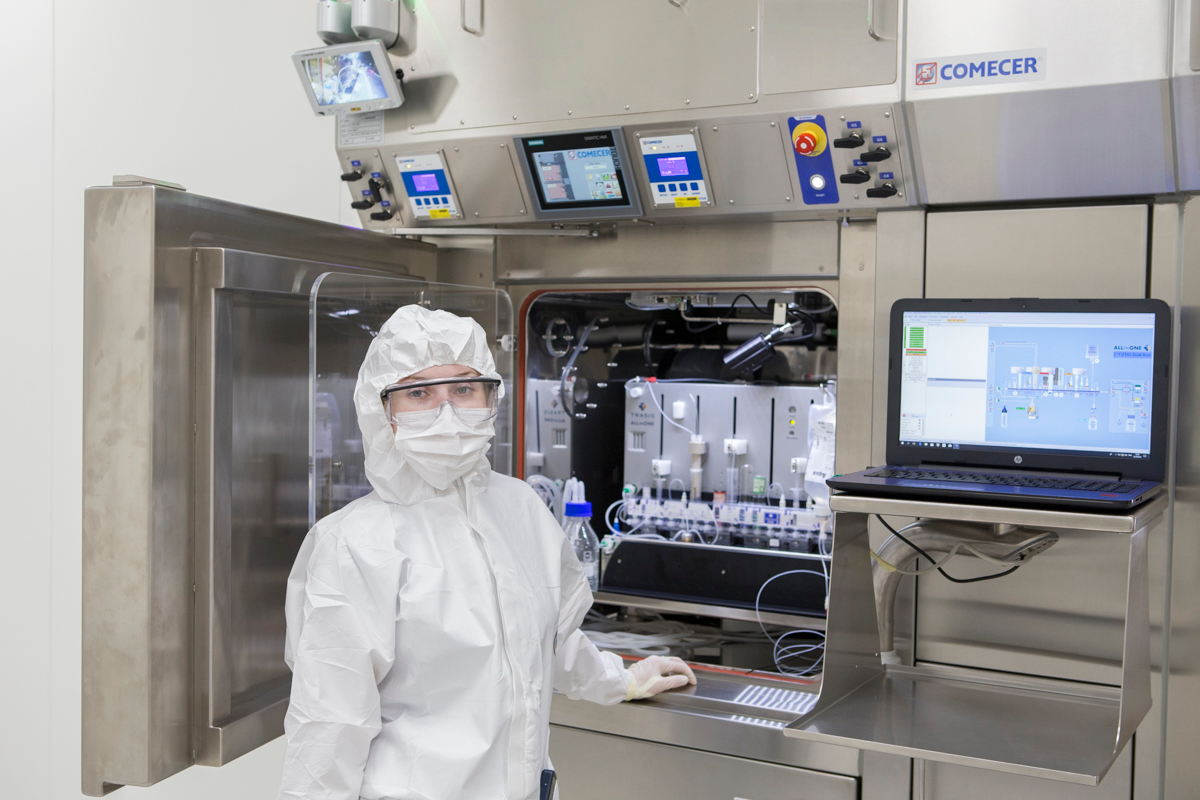 Specialist inside high-tech radiopharmaceutical cleanroom